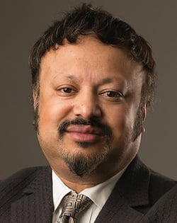 Anirban Basu, Ph.D., J.D., M.P.P., M.A.