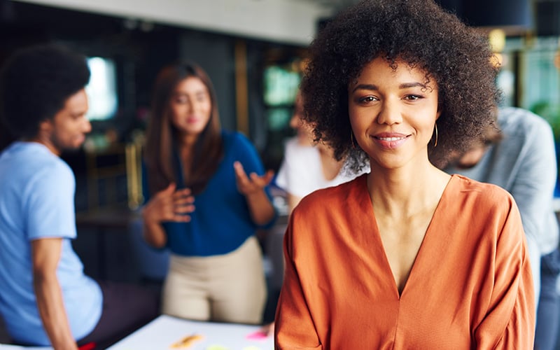 Woman in a collaborative meeting room