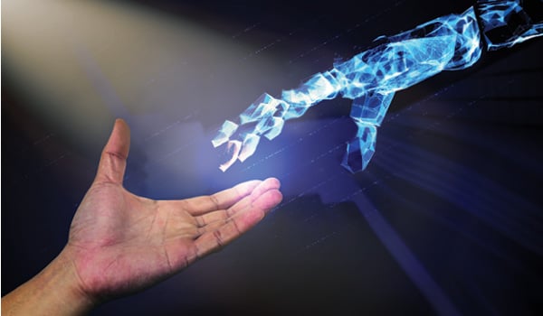 Human hand reaching out to a cyber hand